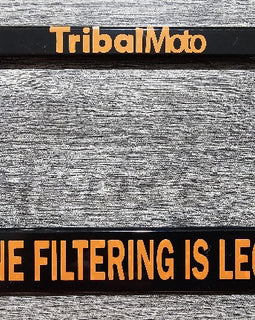 Give them something important to read, by adding this 'Lane filtering is legal' plate frame to your motorcycle in orange