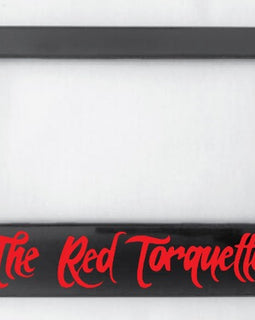 Available to TRT members, this black number plate surround is made from ABS plastic in red writing.