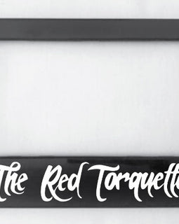 Available to TRT members, this black number plate surround is made from ABS plastic in white writing.