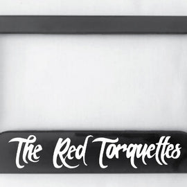 Available to TRT members, this black number plate surround is made from ABS plastic in white writing.