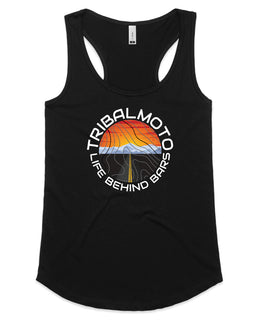 circle design includes the words TribalMoto and Life Behind Bars with a sunset, mountains and a road. Layered with topographical lines on black  tank top