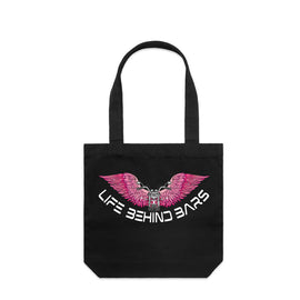 This stunning design includes a motorbike in front of open wings and the words Life Behind Bars across the bottom. Pink on a black tall tote.