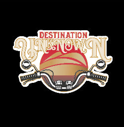 Motorbike sticker with the words destination unknown in front of a sunset and motorbike handlebars
