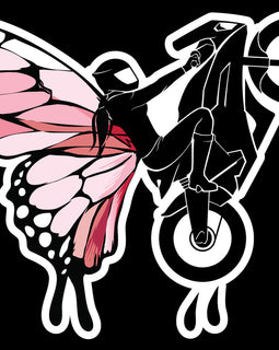 Image of black motorbike and rider wearing pink and black butterfly wings.