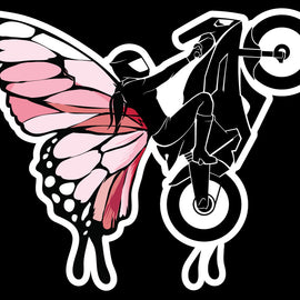 Image of black motorbike and rider wearing pink and black butterfly wings.