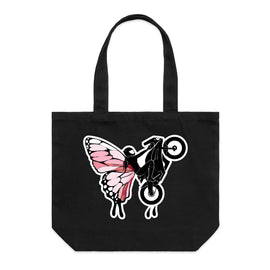 Wide black tote with design of female on motorcycle with butterfly wing