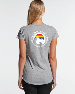 Grey marle ladies tee with image of mountains, rainbow sky and words in a circule race the rain, ride the wind, chase the sun