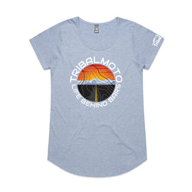 Design of a sunset with road and mountains, layered with topography lines and surrounded by the words TribalMoto Life behind bars on ablue tee