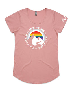 Rose ladies tee with image of mountains, rainbow sky and words in a circule race the rain, ride the wind, chase the sun