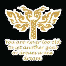 Gold tribal image of heart, wings and motorcycle tyre with the words You are never too old to set another goal or dream a a new dream.