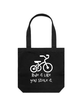 Ride it like you stole it - what ever it is! This great design is of a trike, with the words Ride it like you stole it underneath on a tall tote bag