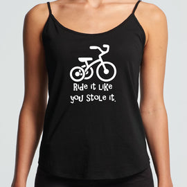Ride it like you stole it - what ever it is! This great design is of a trike, with the words Ride it like you stole it underneath on a black string singlet
