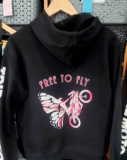 Black hoodie with design of butterfly and lady motorbike rider doing a wheelie with the words Free to fly above.